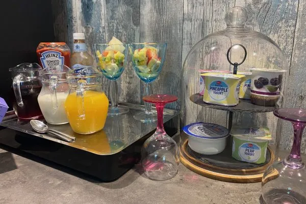 Condiments bar at Toppesfield House with drinks and yogurts